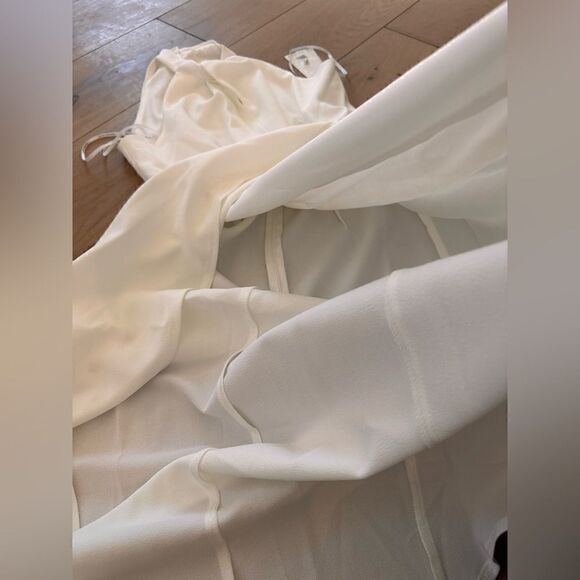 Julia Jordan
Knot Halter Neck Sleeveless Faux Wrap Tulip Hem Midi Dress IVORY - Picture 5 of 7